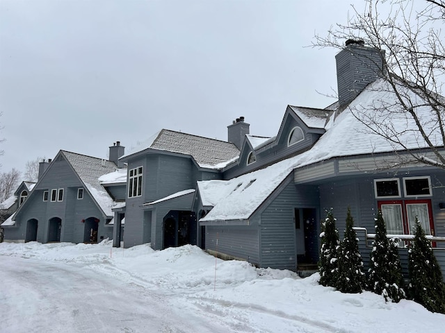 view of front of house with a chimney