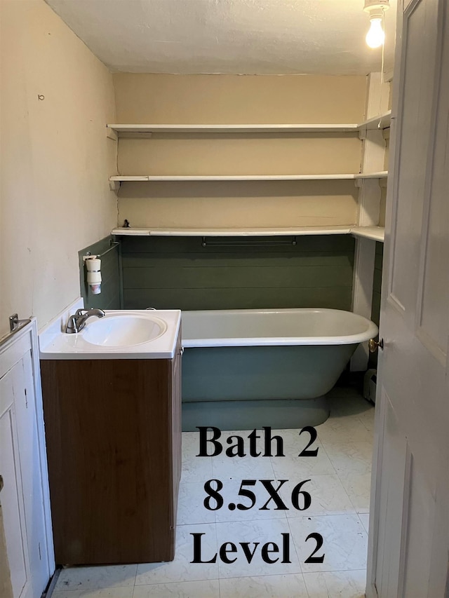 622 S Main St, Danby, VT 05739 - bathroom with vanity and a tub