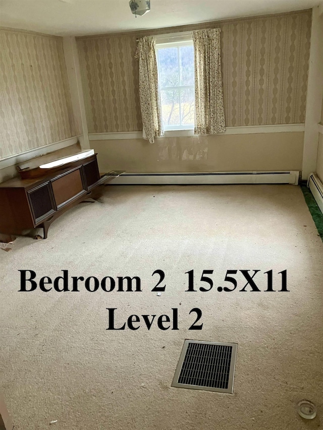 622 S Main St, Danby, VT 05739 - unfurnished room with a baseboard heating unit