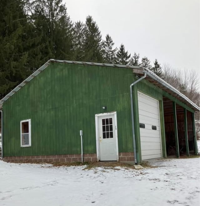 622 S Main St, Danby, VT 05739 - snow covered structure with a garage