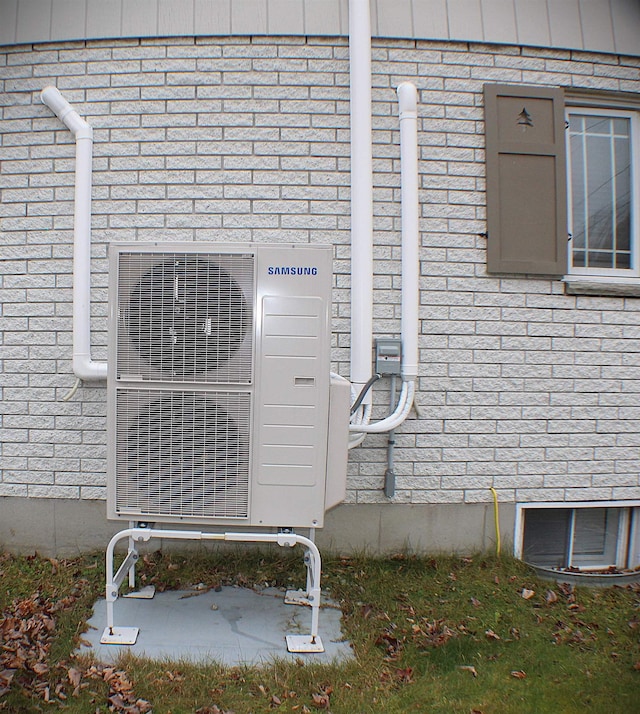 exterior details featuring ac unit