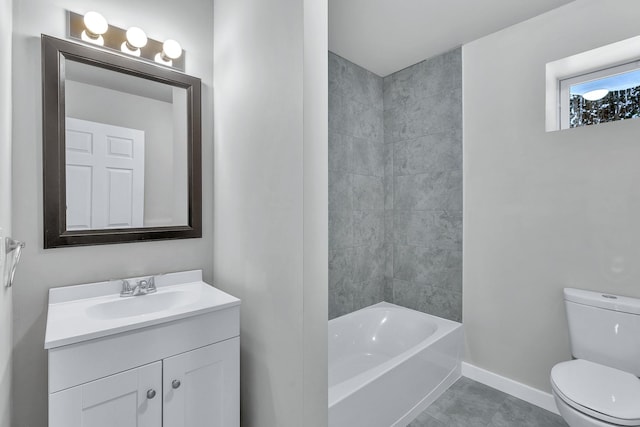 full bathroom featuring tile patterned floors, vanity, toilet, and tiled shower / bath