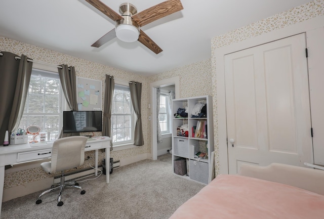 carpeted bedroom with ceiling fan