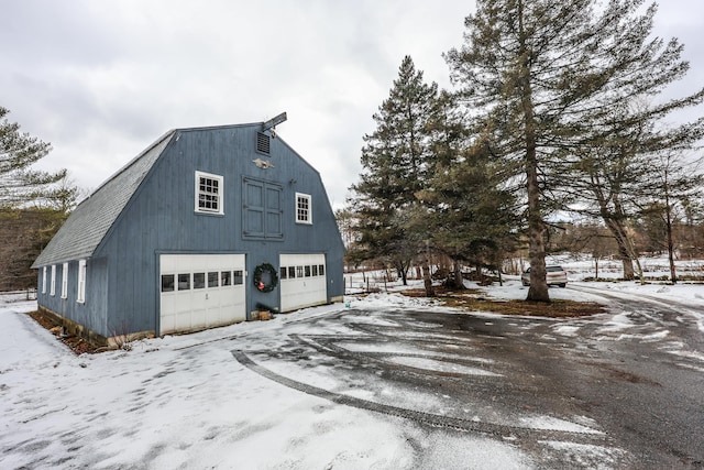 view of snow covered garage