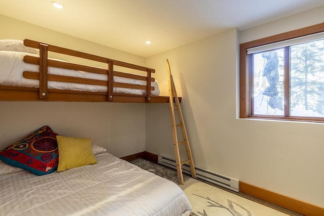 bedroom featuring a baseboard radiator