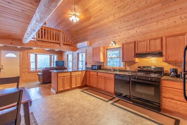 kitchen with dark countertops, black appliances, under cabinet range hood, and open floor plan