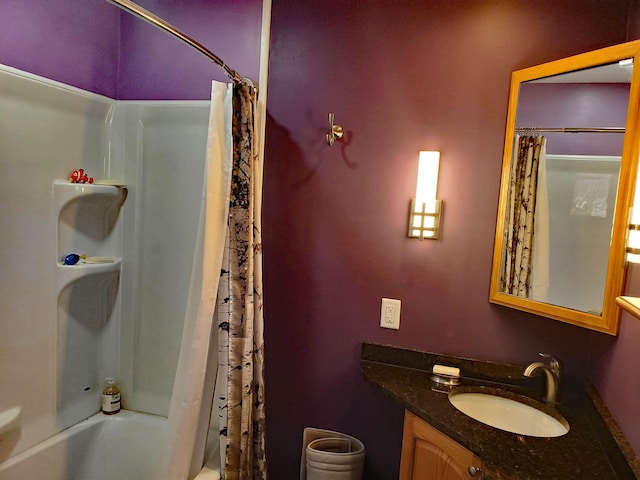 bathroom with vanity and shower / bathtub combination with curtain