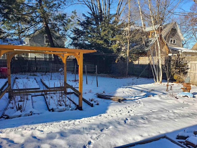 view of yard layered in snow