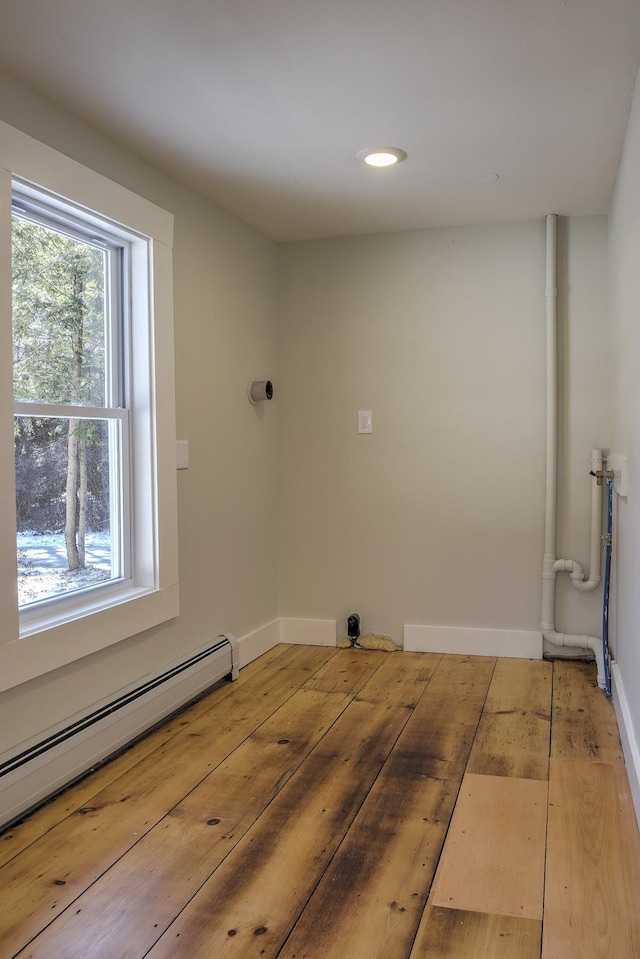 laundry room with baseboard heating