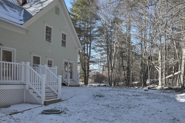 view of yard covered in snow