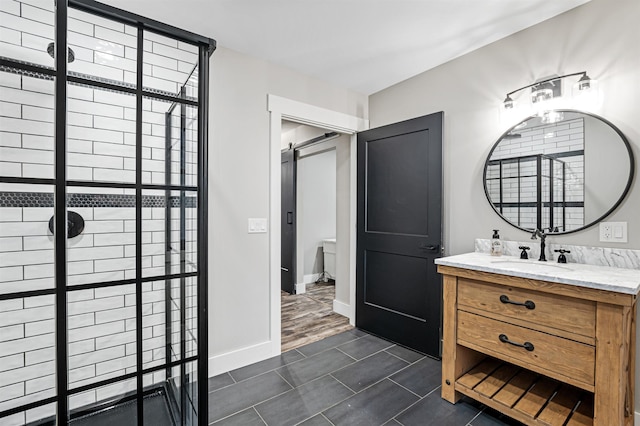 bathroom featuring tile patterned flooring and vanity