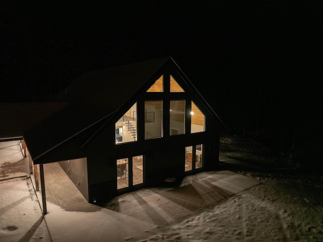 back house at night with french doors