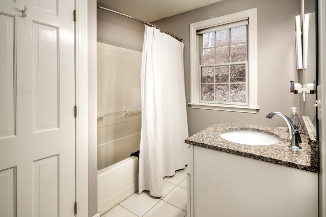 bathroom featuring tile patterned flooring, vanity, and shower / bathtub combination with curtain