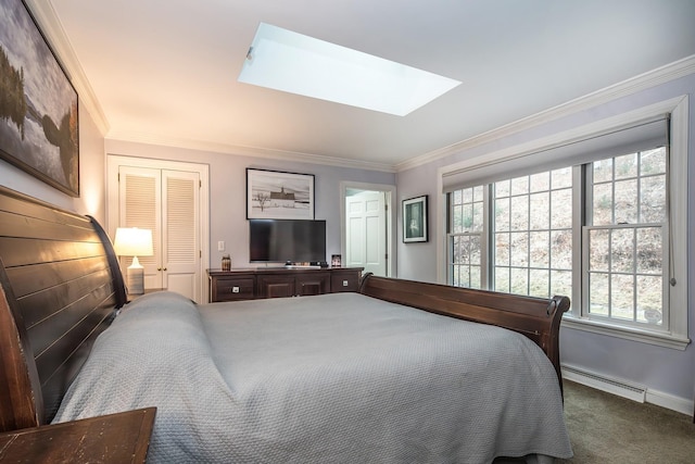 carpeted bedroom featuring multiple windows, ornamental molding, a baseboard heating unit, and a skylight