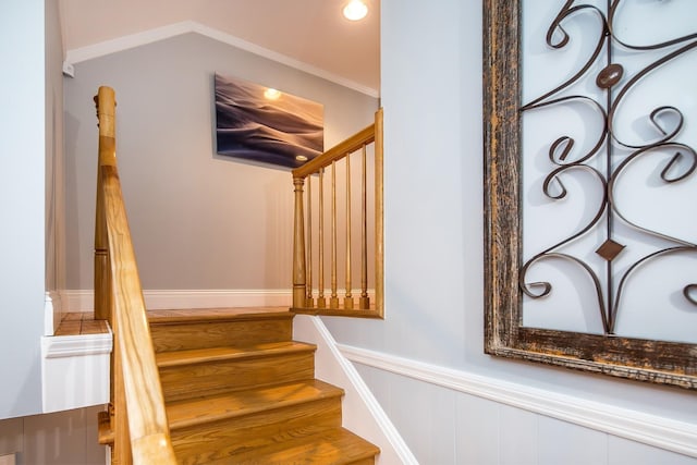 stairway with crown molding