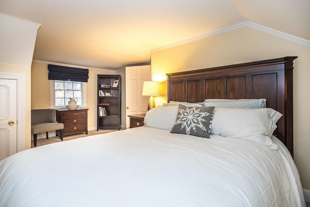 carpeted bedroom with crown molding