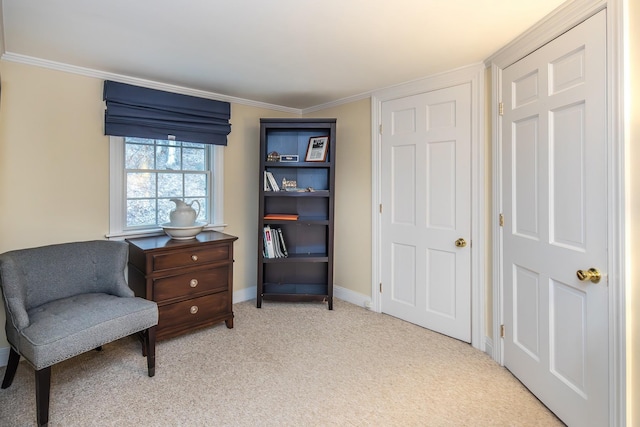 living area with light carpet and ornamental molding