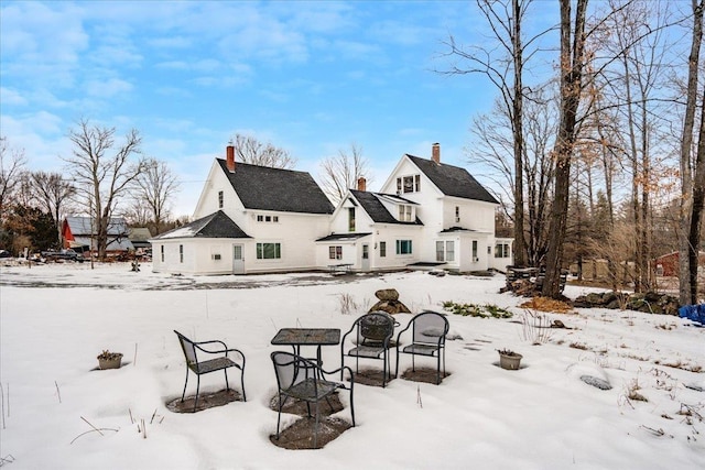 view of yard layered in snow