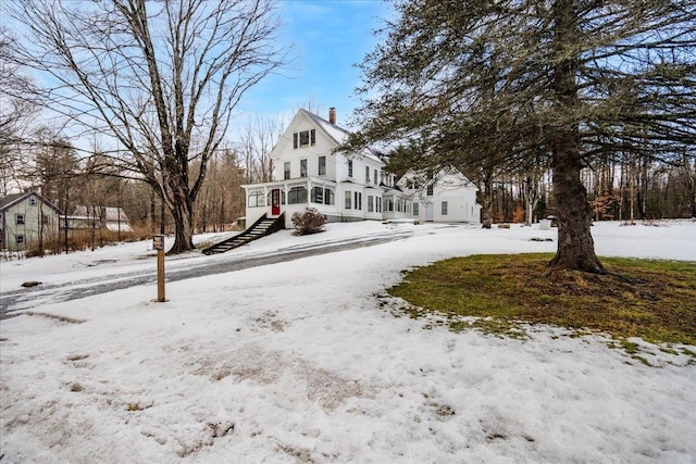 view of yard covered in snow