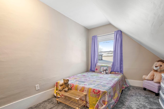 carpeted bedroom featuring vaulted ceiling