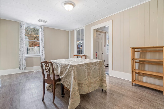 dining area with wood-type flooring