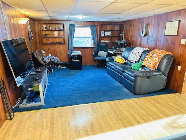 living room featuring wooden walls