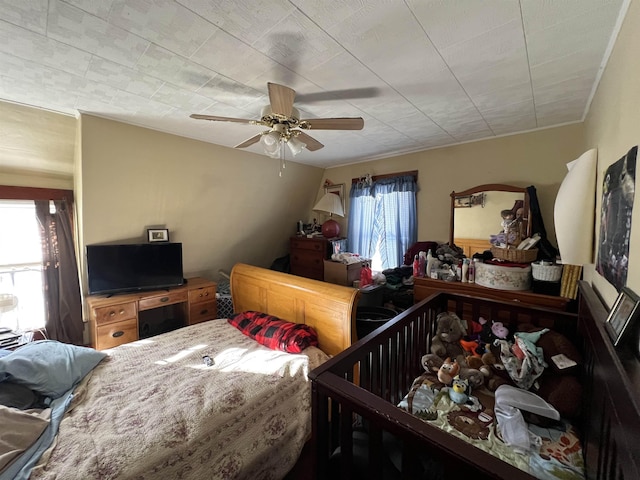 bedroom featuring ceiling fan