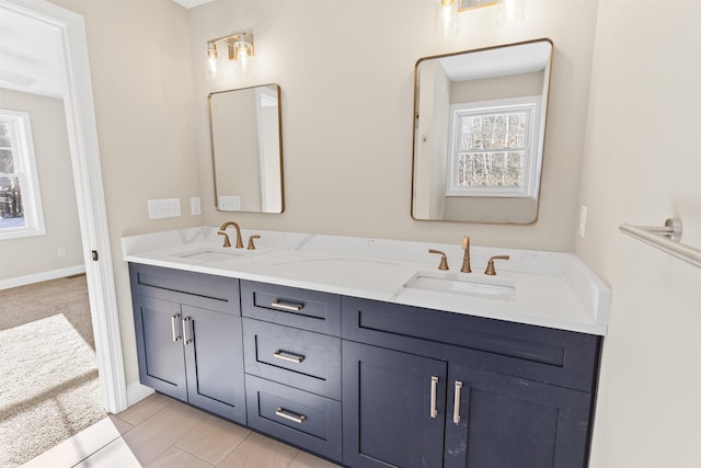 bathroom featuring tile patterned floors and vanity