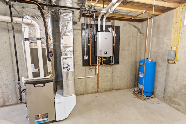 utility room with tankless water heater