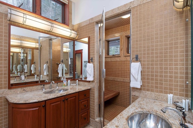 51 E Ash Rd, Plymouth, VT 05056 - bathroom featuring vanity and tile walls