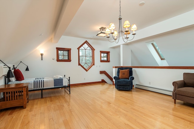 51 E Ash Rd, Plymouth, VT 05056 - bedroom with a chandelier, hardwood / wood-style flooring, a baseboard heating unit, and vaulted ceiling with skylight
