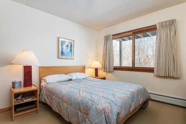 360 Okemo Trailside Ext Unit 37C, Ludlow, VT 05149 - bedroom featuring carpet and a baseboard heating unit