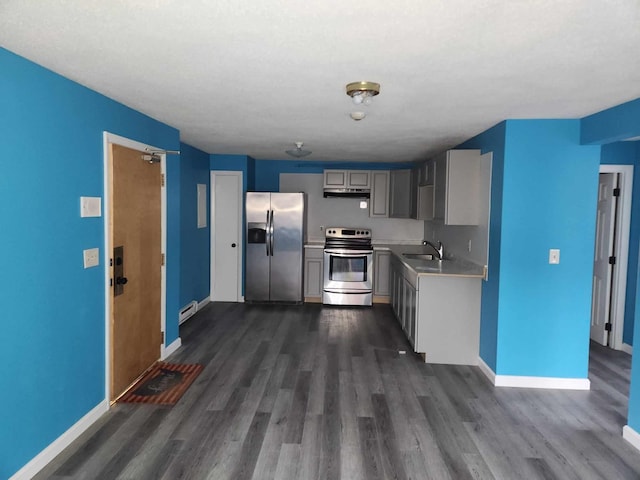 kitchen featuring gray cabinets, stainless steel appliances, dark hardwood / wood-style flooring, and sink