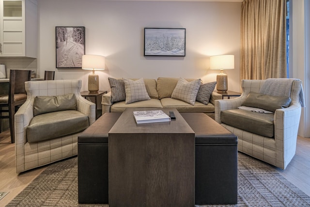 living room with light hardwood / wood-style floors