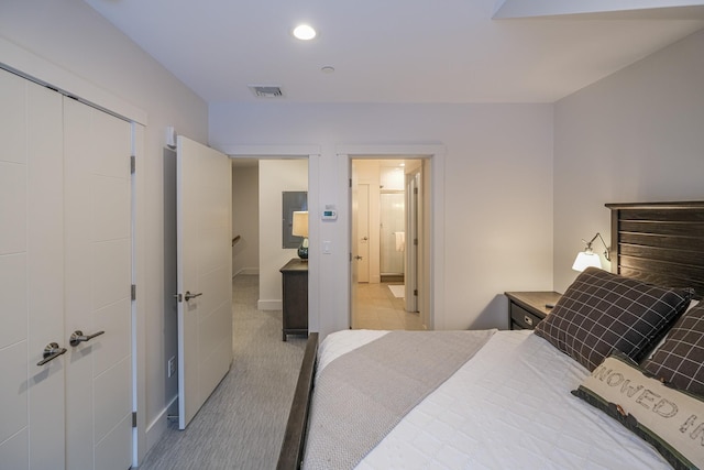 carpeted bedroom featuring a closet