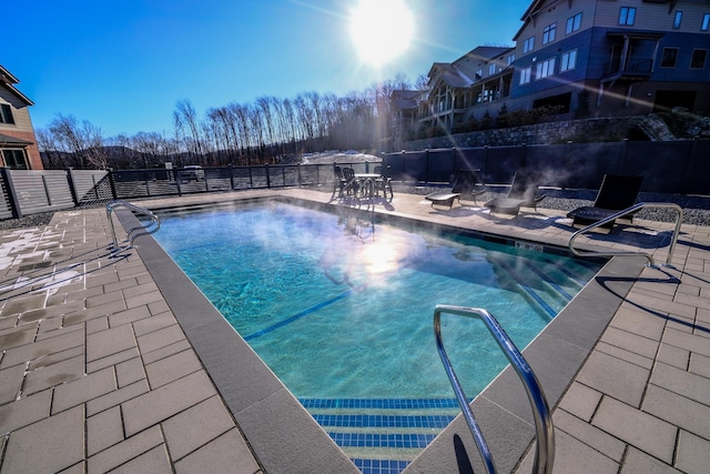 view of pool featuring a patio area