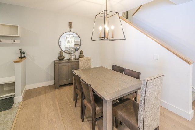 dining area with light hardwood / wood-style flooring