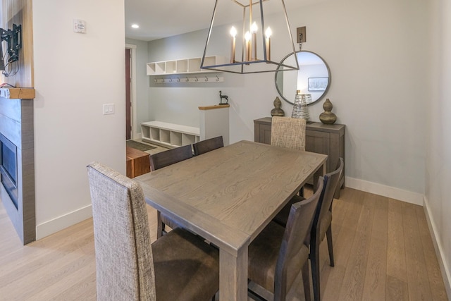 dining space with light wood-type flooring