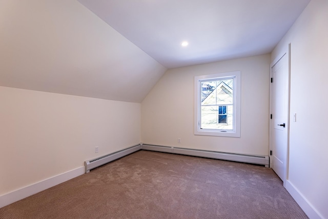 bonus room featuring carpet flooring, a baseboard radiator, and lofted ceiling