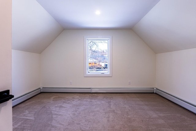 bonus room featuring carpet flooring, lofted ceiling, and baseboard heating