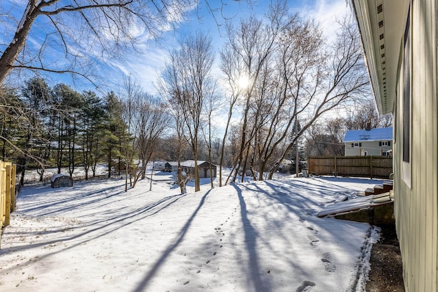 view of yard covered in snow