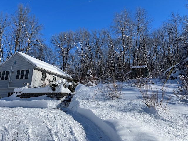 view of snow covered property