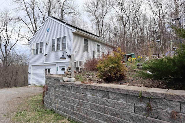 exterior space with a garage and driveway
