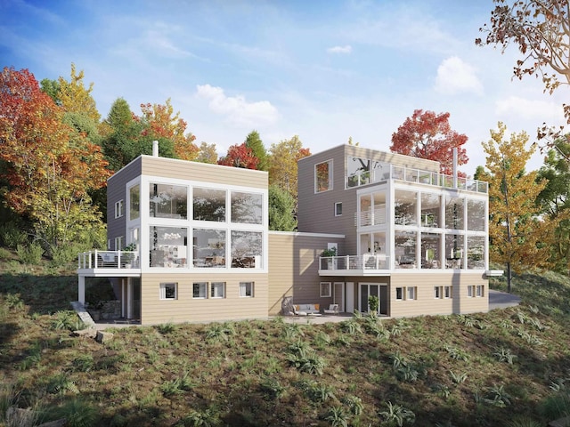 LOT27 Roundabout Rd Unit 1, Killington, VT 05751 - back of property featuring a sunroom and a balcony