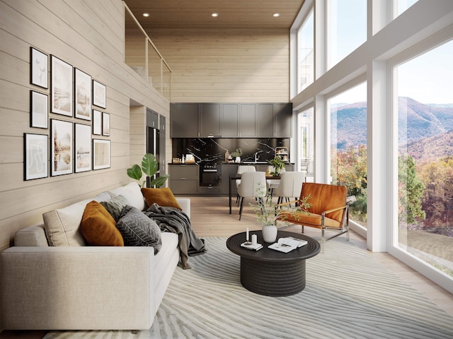 LOT27 Roundabout Rd Unit 1, Killington, VT 05751 - sunroom / solarium with a mountain view, wooden ceiling, and a healthy amount of sunlight
