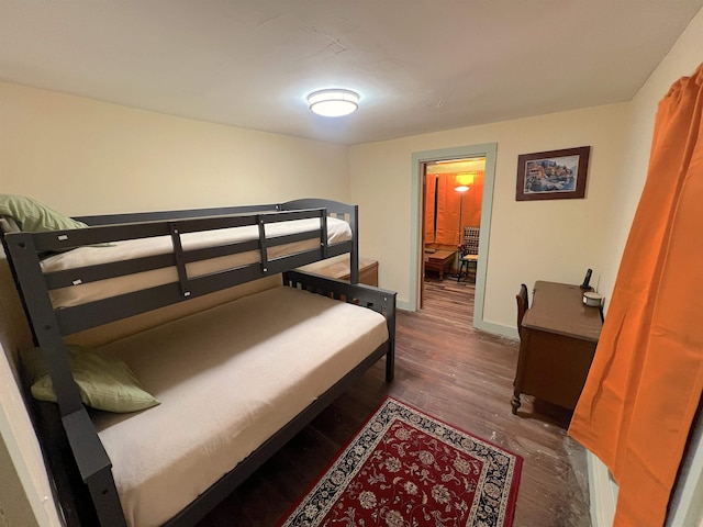 bedroom featuring dark hardwood / wood-style floors