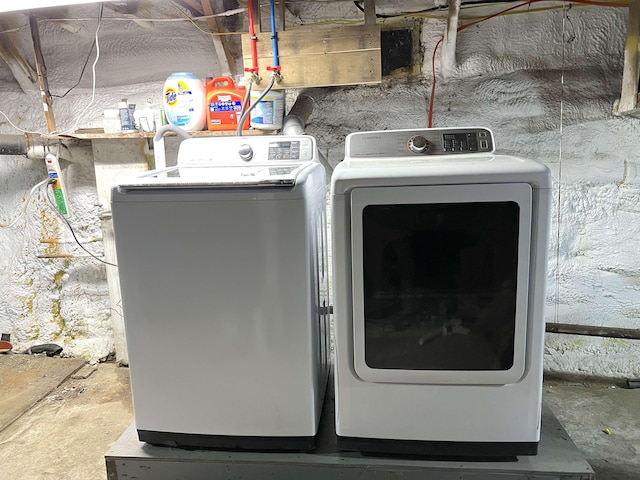 laundry area featuring washing machine and dryer