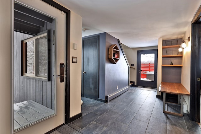 mudroom featuring baseboard heating