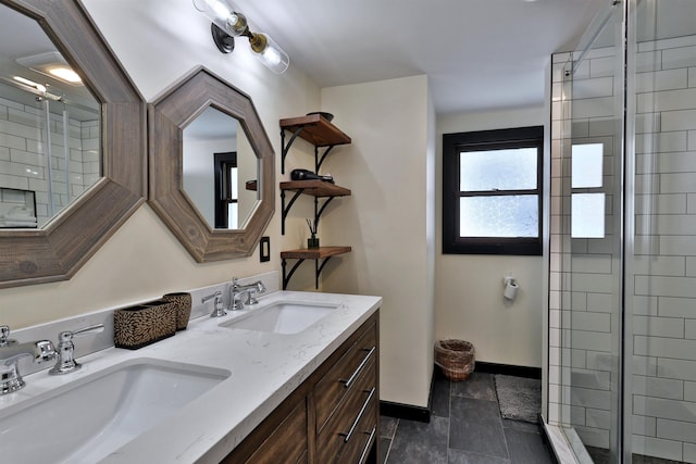 bathroom featuring tile patterned floors, vanity, and a shower with shower door