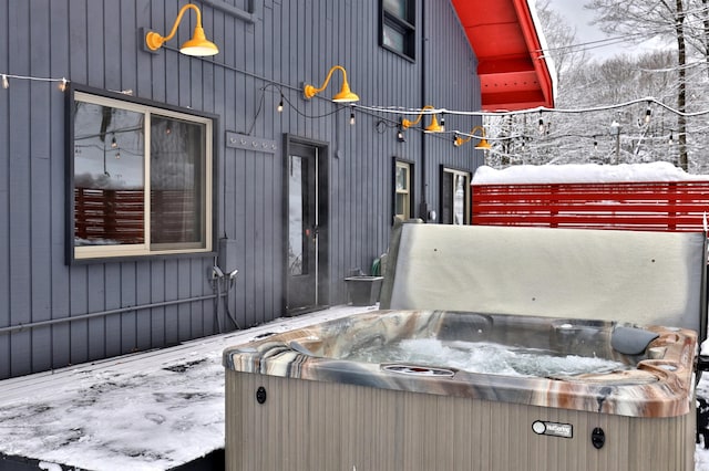 exterior space with a hot tub